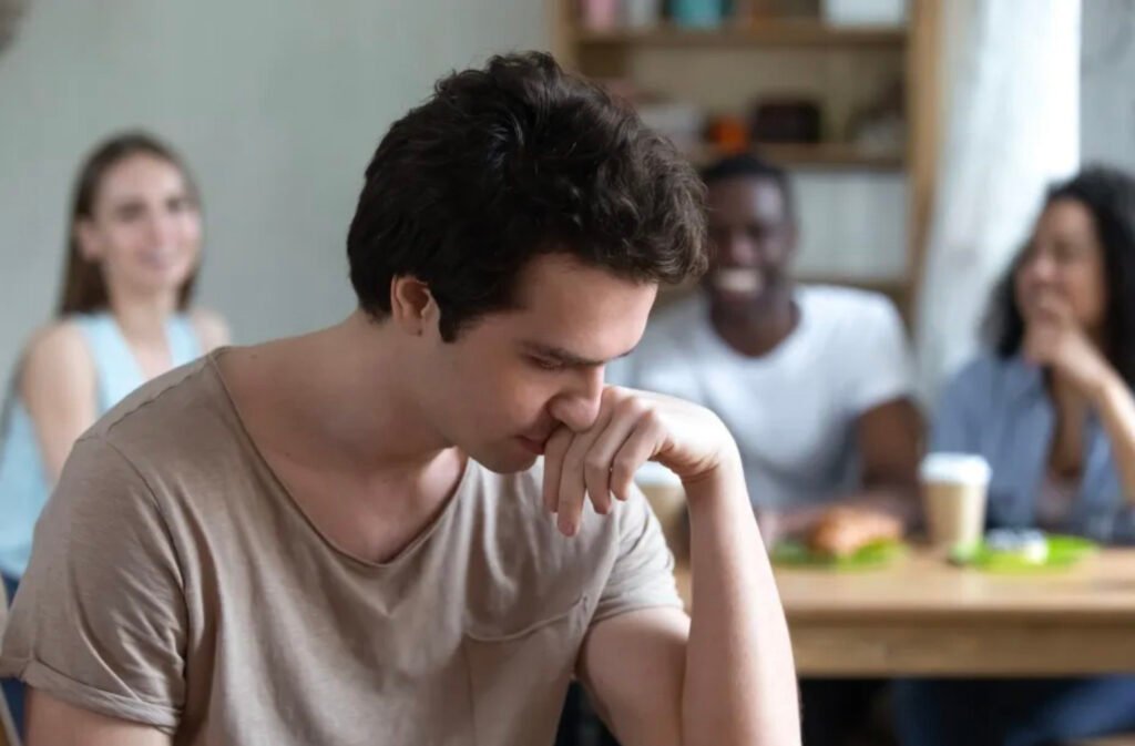 Impact of slouching on self-confidence. Poor posture and its effect on self-esteem.