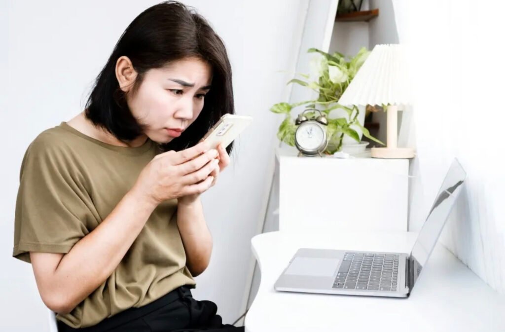 Tech neck from smartphone overuse. Hunched posture due to screen addiction.